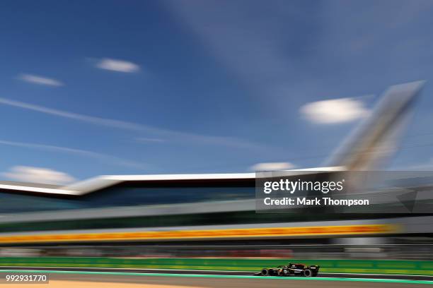 Carlos Sainz of Spain driving the Renault Sport Formula One Team RS18 on track during practice for the Formula One Grand Prix of Great Britain at...
