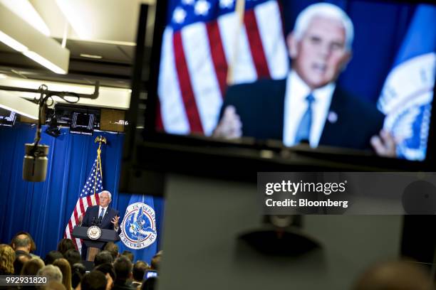 Vice President Mike Pence, bottom left, speaks at the U.S. Immigration and Customs Enforcement agency headquarters in Washington, D.C., U.S., on...