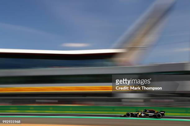 Carlos Sainz of Spain driving the Renault Sport Formula One Team RS18 on track during practice for the Formula One Grand Prix of Great Britain at...