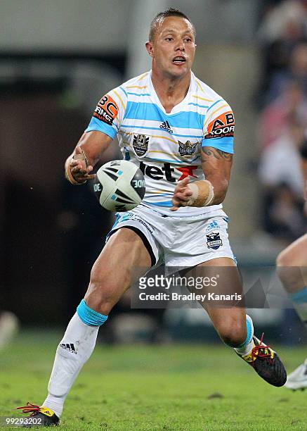 Scott Prince of the Titans passes the ball during the round 10 NRL match between the Brisbane Broncos and the Gold Coast Titans at Suncorp Stadium on...