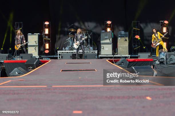 Dan Hawkins, Justin Hawkins and Frankie Poullain of The Darkness perform on stage during TRNSMT Festival Day 4 at Glasgow Green on July 6, 2018 in...