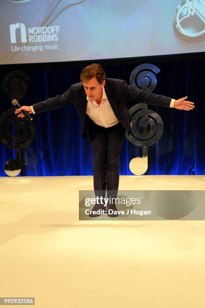 Presenter Rob Brydon on stage during the Nordoff Robbins' O2 Silver Clef Awards ceremony at Grosvenor House, on July 6, 2018 in London, England.