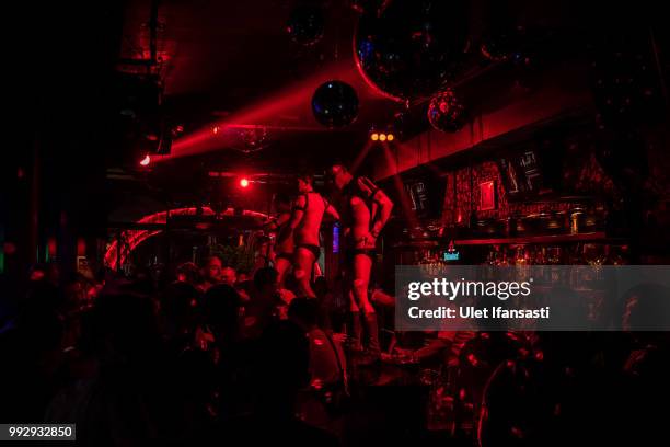 Indonesian male Go-Go dancers perform in Mixwell bar on July 5, 2018 in Seminyak, Bali, Indonesia. For the past 12 years Mixwell bar has been...