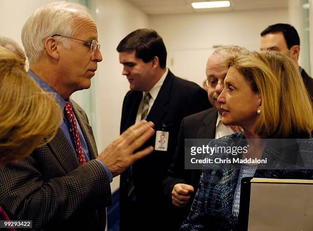 Rep. Christopher Shays, R-Ct., speaks with Rep. Carolyn Maloney, D-NY, before at press conference urging Congressial committee reform recommended by...