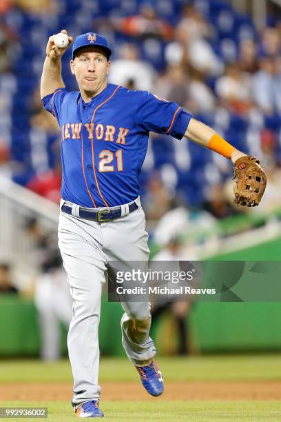 Todd Frazier of the New York Mets throws out a runner at first base against the Miami Marlins at Marlins Park on June 29, 2018 in Miami, Florida.