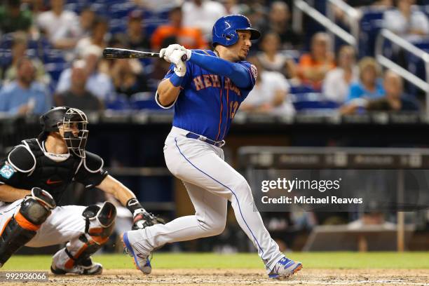 Asdrubal Cabrera of the New York Mets in action against the Miami Marlins at Marlins Park on June 29, 2018 in Miami, Florida.