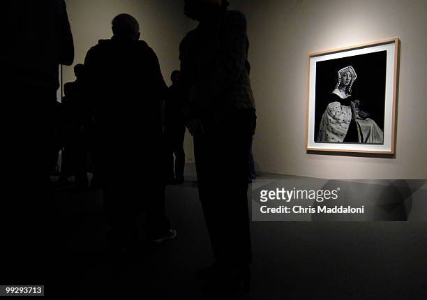 Museum-goers attend a tour of Hiroshi Sugimoto's photography exhibit on its opening day at the Hirshhorn Museum.