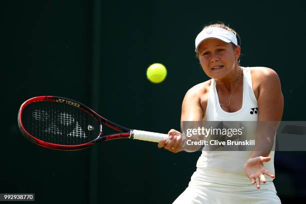 Evgeniya Rodina of Russia returns a shot against Madison Keys of the United States during their Ladies' Singles third round match on day five of the...