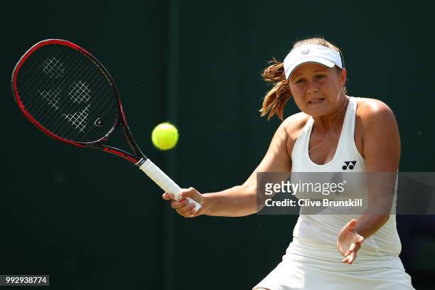 Evgeniya Rodina of Russia returns a shot against Madison Keys of the United States during their Ladies' Singles third round match on day five of the...