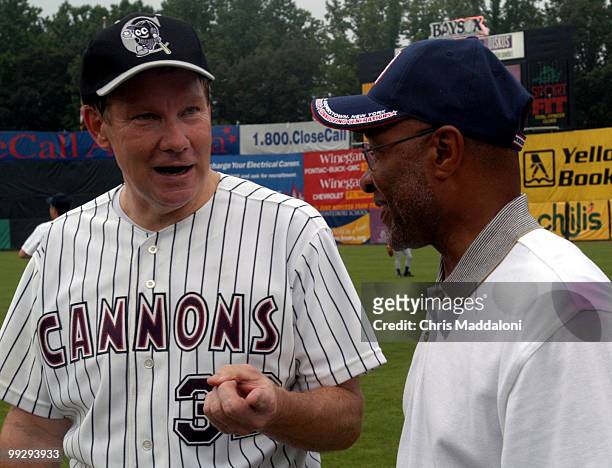 Hall of Fame Baseball Player Ozzie Smith greets Rep. Tom Davis, R-Va., at the start of the Congressional Baseball game in Bowie, Md. The Republicans...