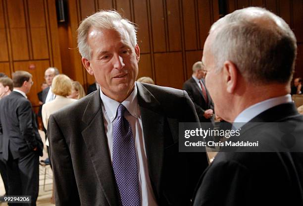 James McNerney Jr., chairman, president, and CEO, speaks with Sen. Mark Dayton, D-Mn., before a Senate Armed Services Committee hearing on the "The...