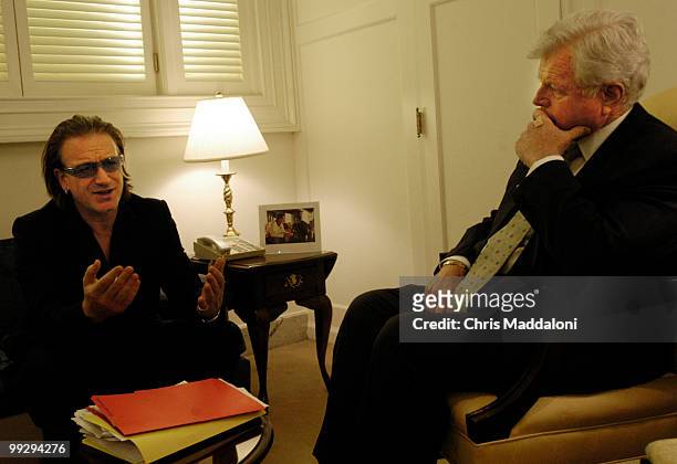 Bono, founder, DATA and singer of U2 meets with Sen. Edward Kennedy, D-Ma., after testifying at a Senate Appropriations AIDS Programs and Research...