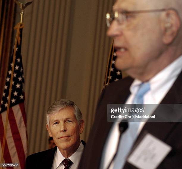 Fmr. Sen. Connie Mack watches Rep. John Dingell, D-Mich., at the Susan Komen Breast Cancer Foundation 4th annual public policy luncheon. Dingell and...