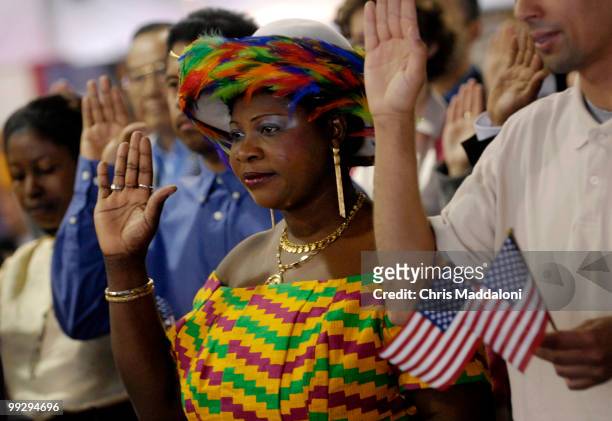 Ghanaian Mary Gyimah is sworn-in as a U.S. Citizen during a U.S. Citizenship and Immigration Services naturalization ceremony on the National Mall at...