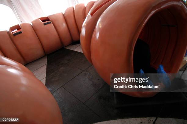 Visitor crawls through a 40 ft. Colon model at the Colossal Colon Tour at Freedom Plaza. The event was designed to raise awareness of colon cancer.
