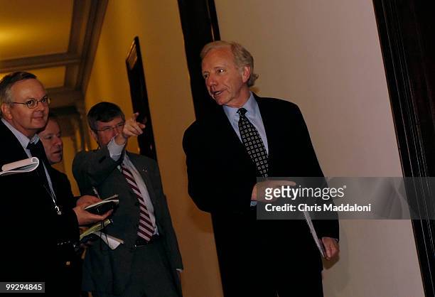 Sen. Joseph Lieberman, D-Ct., enters a meeting meeting at Sen. John McCain's office about a compromise deal being worked on by moderates in the...