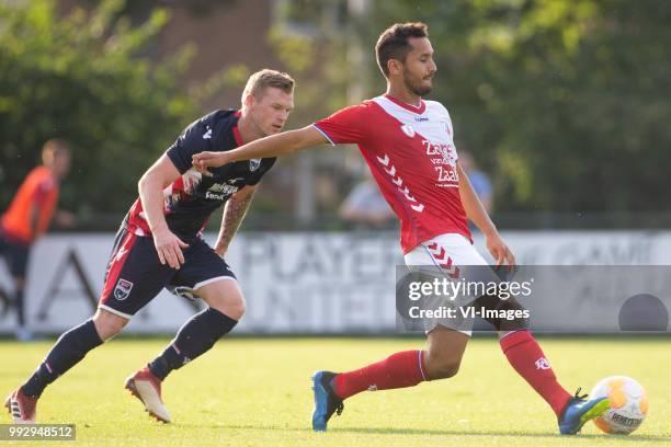 Billy McKay of Ross County, Mark van de Maarel of FC Utrecht during the friendly match between FC Utrecht and Ross County at Sportpark Thorbecke on...