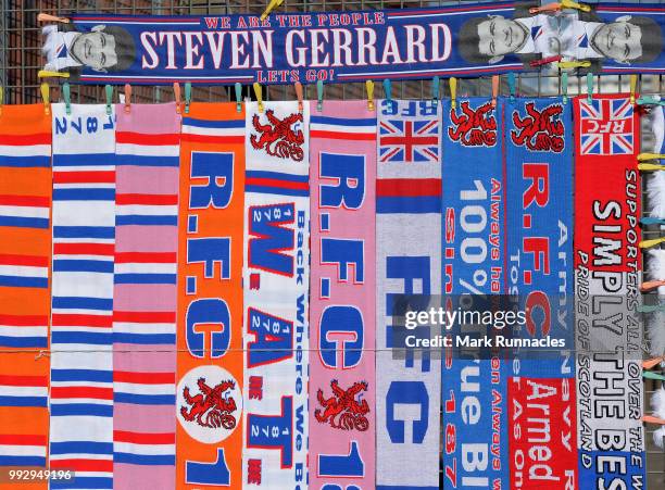 Rangers merchandise bearing the name and face of Ranger new manager Steven Gerrard on display outside Ibrox Stadium during the Pre-Season Friendly...