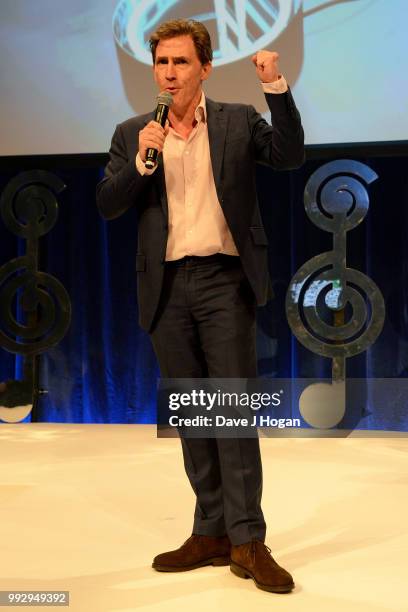 Presenter Rob Brydon on stage during the Nordoff Robbins' O2 Silver Clef Awards ceremony at Grosvenor House, on July 6, 2018 in London, England.