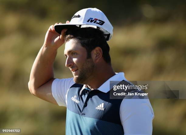 Jon Rahm of Spain acknowledges the crowd on the 18th green during the second round of the Dubai Duty Free Irish Open at Ballyliffin Golf Club on July...