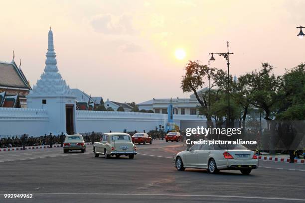 The royal ashes of King Bhumibol of Thailand are carried on in Bangkok in a procession that will proceed to Wat Ratchabophit Sathit Maha Simaram and...