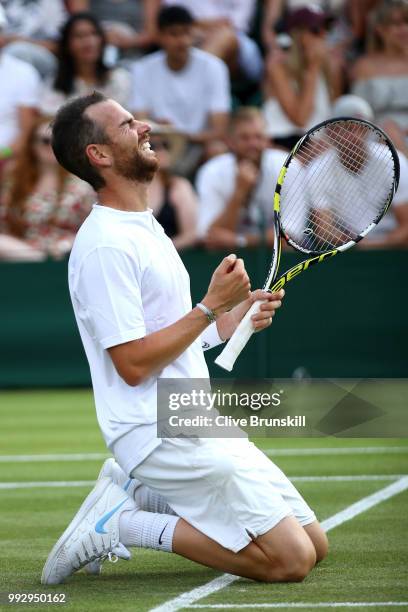 Adrian Mannarino of France celebrates after defeating Daniil Medvedev of Russia in their Men's Singles third round match on day five of the Wimbledon...