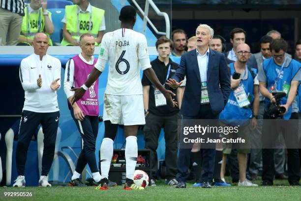 Coach of France Didier Deschamps calms down Paul Pogba of France during the 2018 FIFA World Cup Russia Quarter Final match between Uruguay and France...