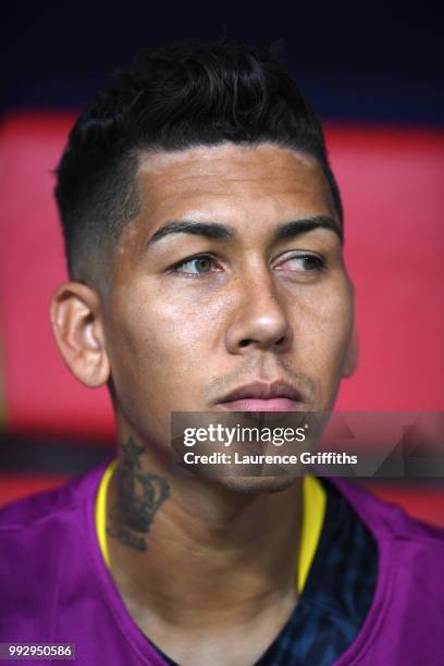 Roberto Firmino of Brazil looks on from the bench prior to the 2018 FIFA World Cup Russia Quarter Final match between Brazil and Belgium at Kazan...