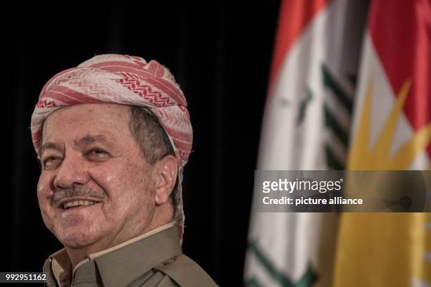 Dpatop - FILE - The President of Iraq's autonomous Kurdistan region, Masoud Barzani, smiles during a press conference in Erbil, Iraq, 24 September...