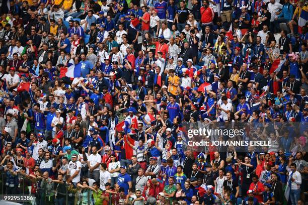 France supporters cheer during the Russia 2018 World Cup quarter-final football match between Uruguay and France at the Nizhny Novgorod Stadium in...