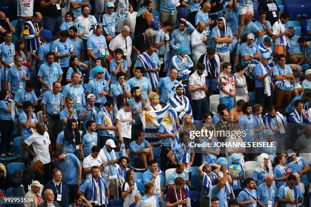 Uruguay supporters look on during the Russia 2018 World Cup quarter-final football match between Uruguay and France at the Nizhny Novgorod Stadium in...