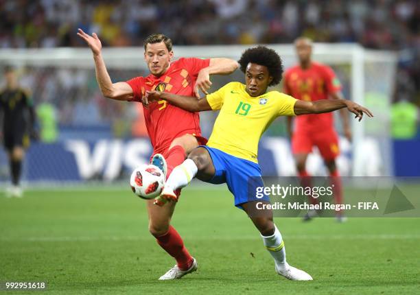 Jan Vertonghen of Belgium battles for possession with Willian of Brazil during the 2018 FIFA World Cup Russia Quarter Final match between Brazil and...