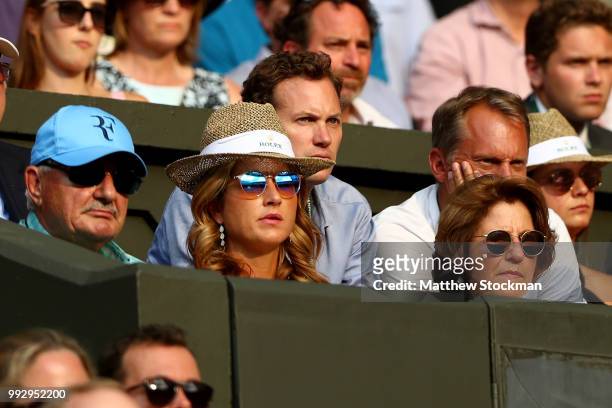 Father Robert Federer, wife Mirka Federer and mother Lynette Federer watch as Roger Federer of Switzerland plays Jan-Lennard Struff of Germany during...