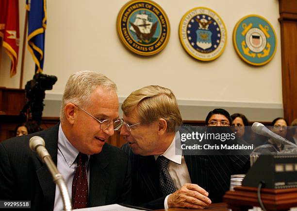 Daniel Dell'Orto, principal deputy general counsel, Defense Department; speaks with Theodore Olson, former U.S. Solicitor general, before testimony...