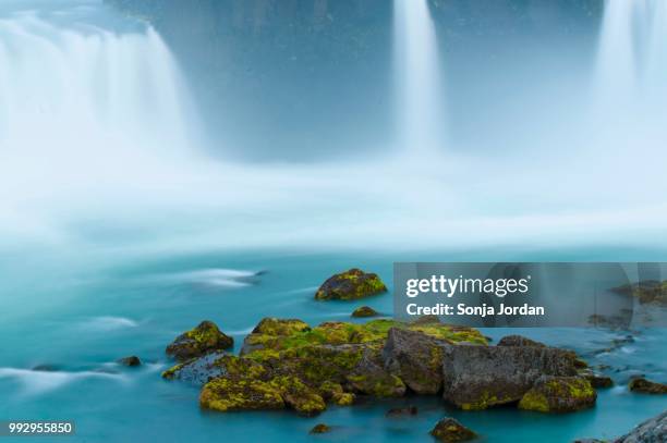 godafoss, waterfall of the gods, iceland - northeast iceland stockfoto's en -beelden