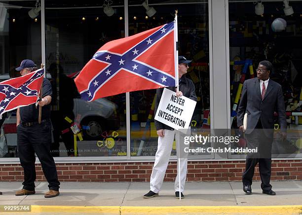 Walter Ring , who drove from the Richmond area to protest the Faith and Politics Institute's delegation to observe how residents of Farmville, Va....