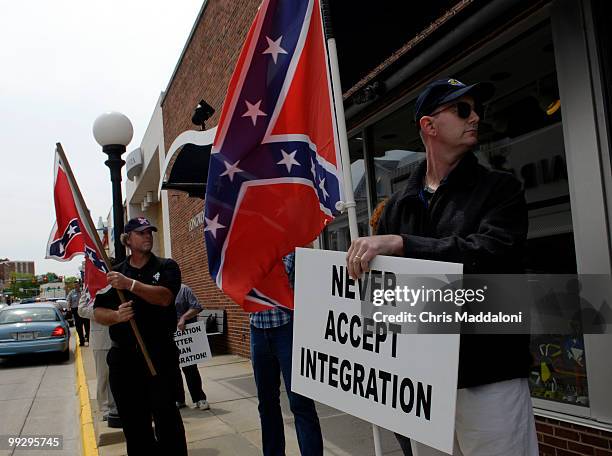 Ron Doggett and Walter Ring drove from the Richmond area to protest the Faith and Politics Institute's delegation to observe how residents of...