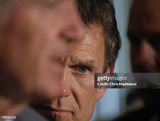 Sen. Tom Daschle, D-SD, watches Sen. Tom Harkin, D-Ia., at press conference announcing the passage in the Senate of a bill that would forbide...