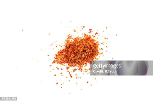 crushed red chili pepper - pepper seasoning stock pictures, royalty-free photos & images