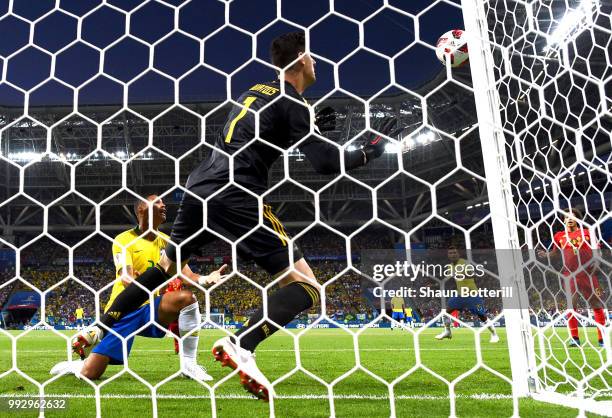 Thiago Silva of Brazil watches as his attempt at goal hits the post as Thibaut Courtois of Belgium looks on during the 2018 FIFA World Cup Russia...