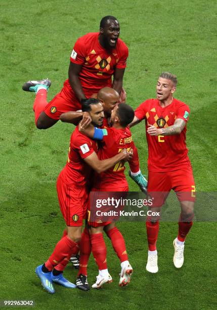 Belgium players celebrate after Fernandinho of Brazil scores an own goal for their sides first goal during the 2018 FIFA World Cup Russia Quarter...