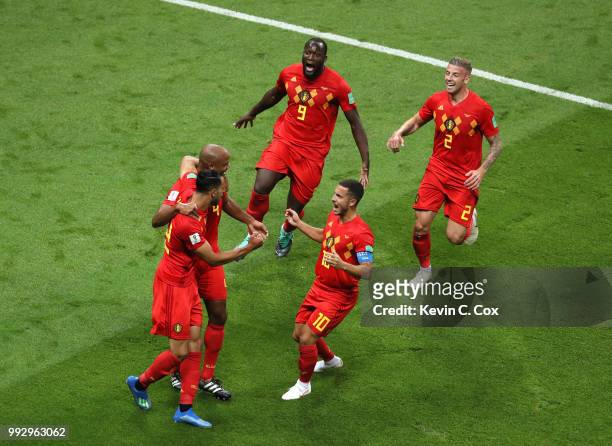 Belgium players celebrate after Fernandinho of Brazil scores an own goal for their sides first goal during the 2018 FIFA World Cup Russia Quarter...