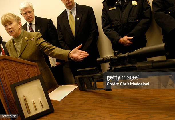 Rep. Carolyn McCarthy, D-NY; Rep. James Moran, D-Va.; Rep. Patrick Kennedy, D-RI; and D.C. Police officers at a news conference to reintroduce...