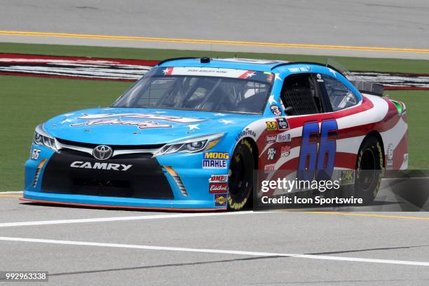 Timmy Hill, driver of the VSI Racing Toyota during practice for the Coca-Cola FireCracker 250 race on July 5 at Daytona International Speedway in...