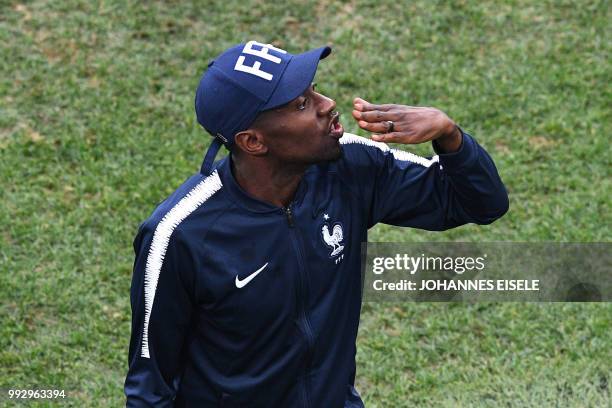 France's midfielder Blaise Matuidi greets the fans after the Russia 2018 World Cup quarter-final football match between Uruguay and France at the...