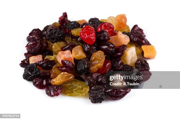 mix variety of dried fruit over white background - fruchtzucker stock-fotos und bilder