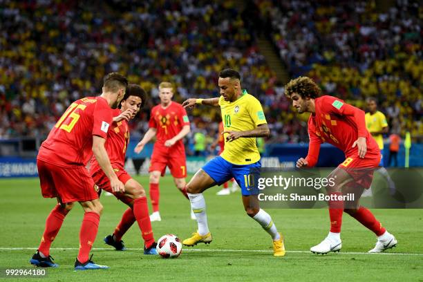 Neymar Jr of Brazil challenge for the ball with Thomas Meunier, Axel Witsel and Marouane Fellaini of Belgium during the 2018 FIFA World Cup Russia...