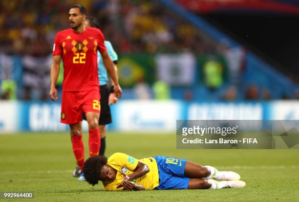 Willian of Brazil goes down during the 2018 FIFA World Cup Russia Quarter Final match between Brazil and Belgium at Kazan Arena on July 6, 2018 in...