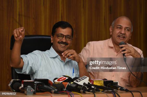 Delhi Chief Minister Arvind Kejriwal with Deputy Chief Minister Manish Sisodia, address media person after meeting with Lieutenant Governor Anil...