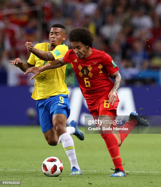 Gabriel Jesus of Brazil and Axel Witsel of Belgium battle for possession during the 2018 FIFA World Cup Russia Quarter Final match between Brazil and...